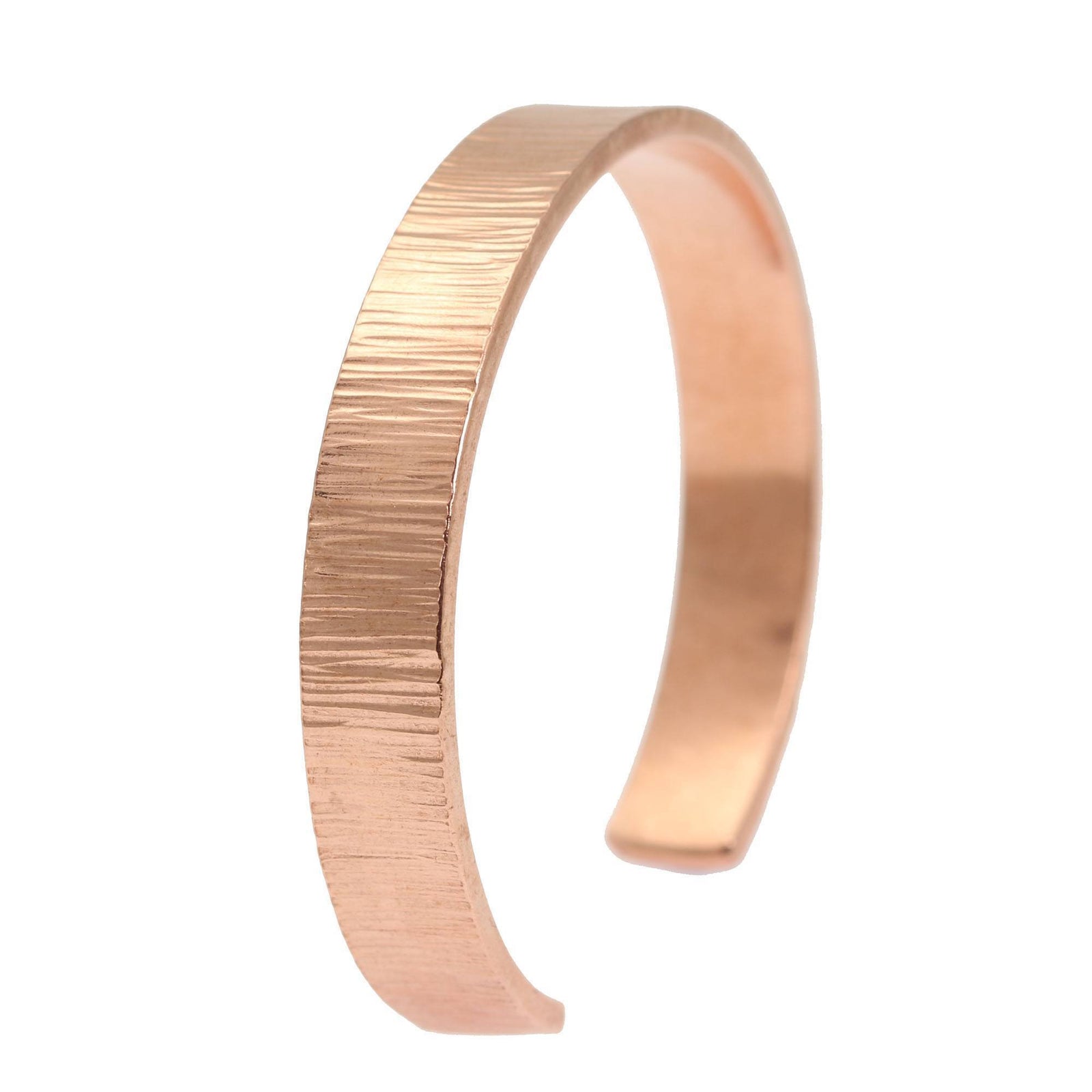 A 10mm Wide Chased Copper Cuff Bracelet on White Background