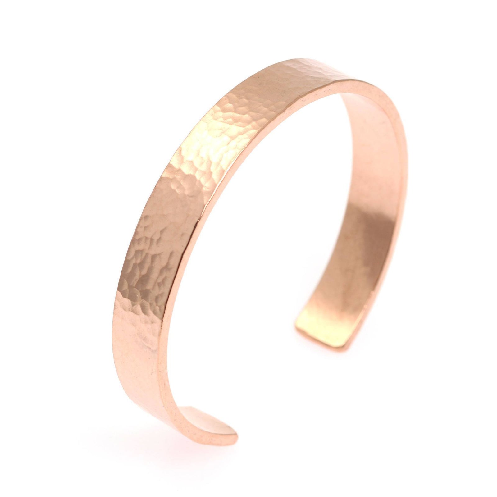 A 10mm Wide Hammered Copper Cuff Bracelet on a White Background
