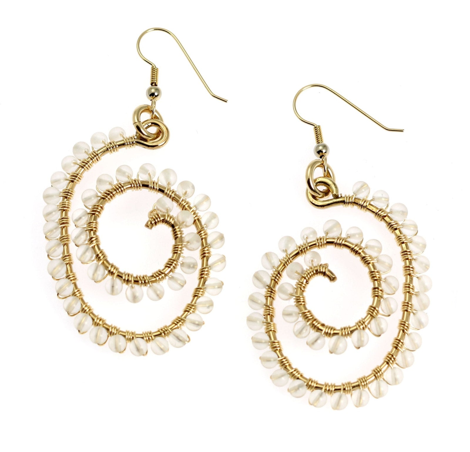 A Pair of 14K Gold-filled Wire Wrapped Spiral Earrings With Crystal on a White Background