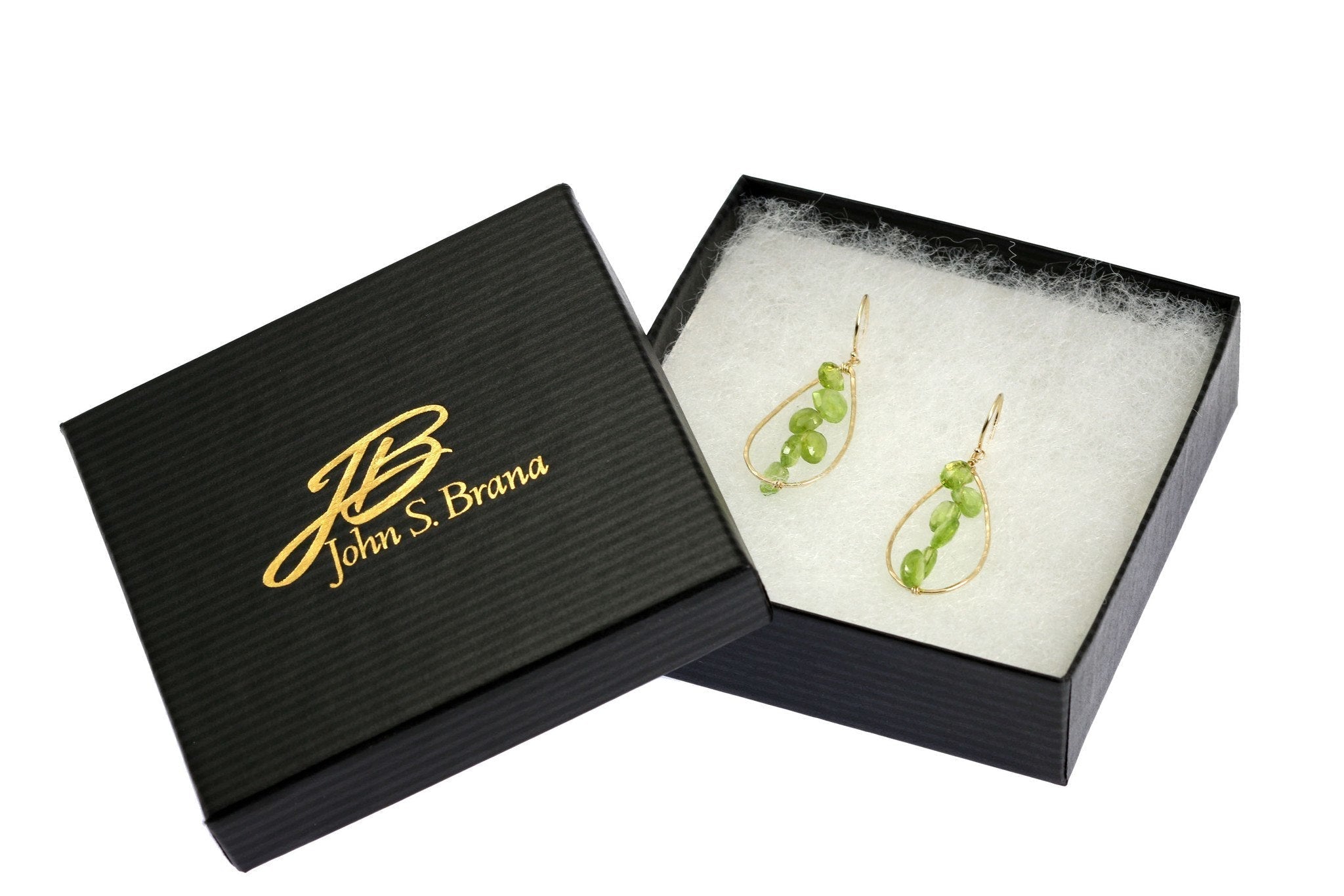 4 of 4: 14K Gold Hammered Teardrop Earrings With Peridot in a Black Gift Box with Gold Logo