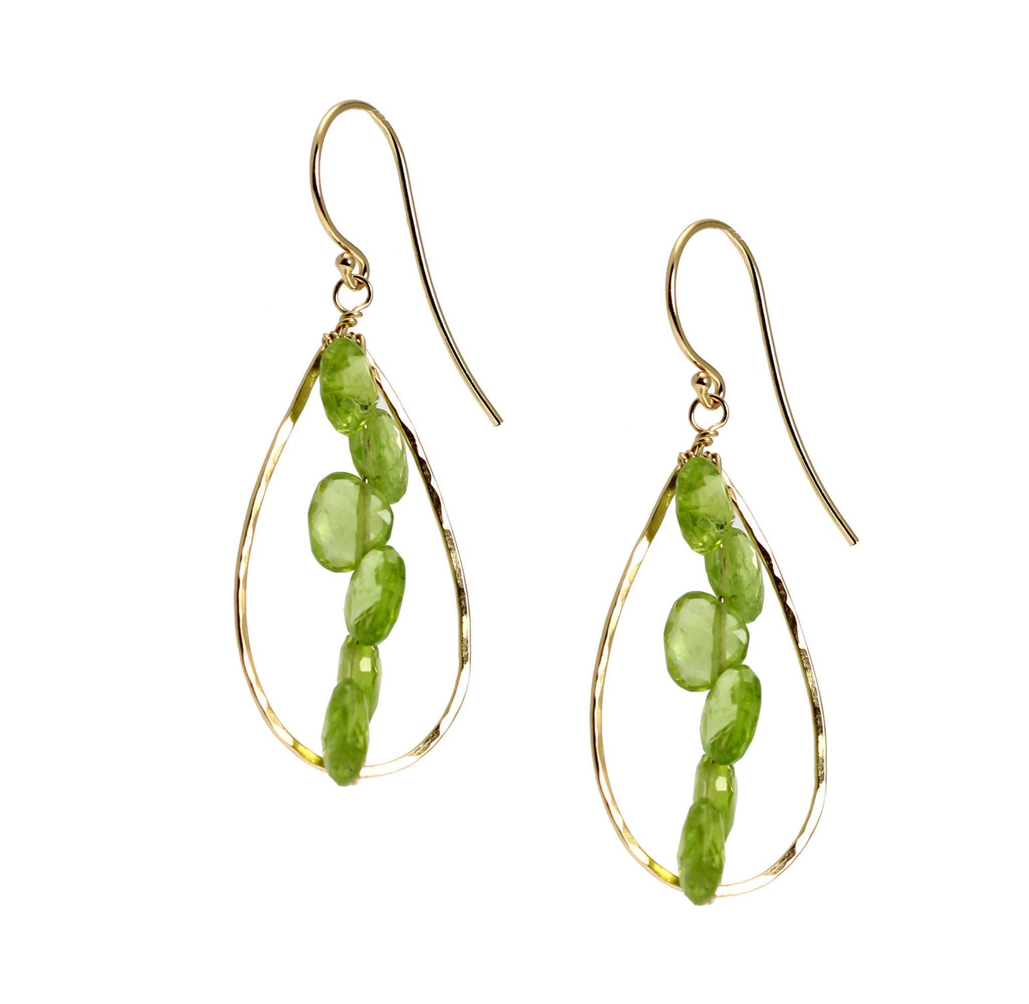3 of 4: Close Up View of 14K Gold Hammered Teardrop Earrings With Peridot