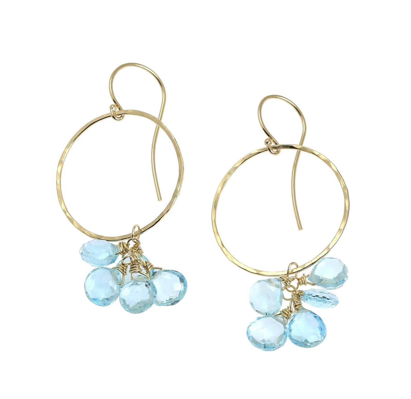 A Pair of 14K Hammered Gold Earrings With Blue Topaz on a White Background