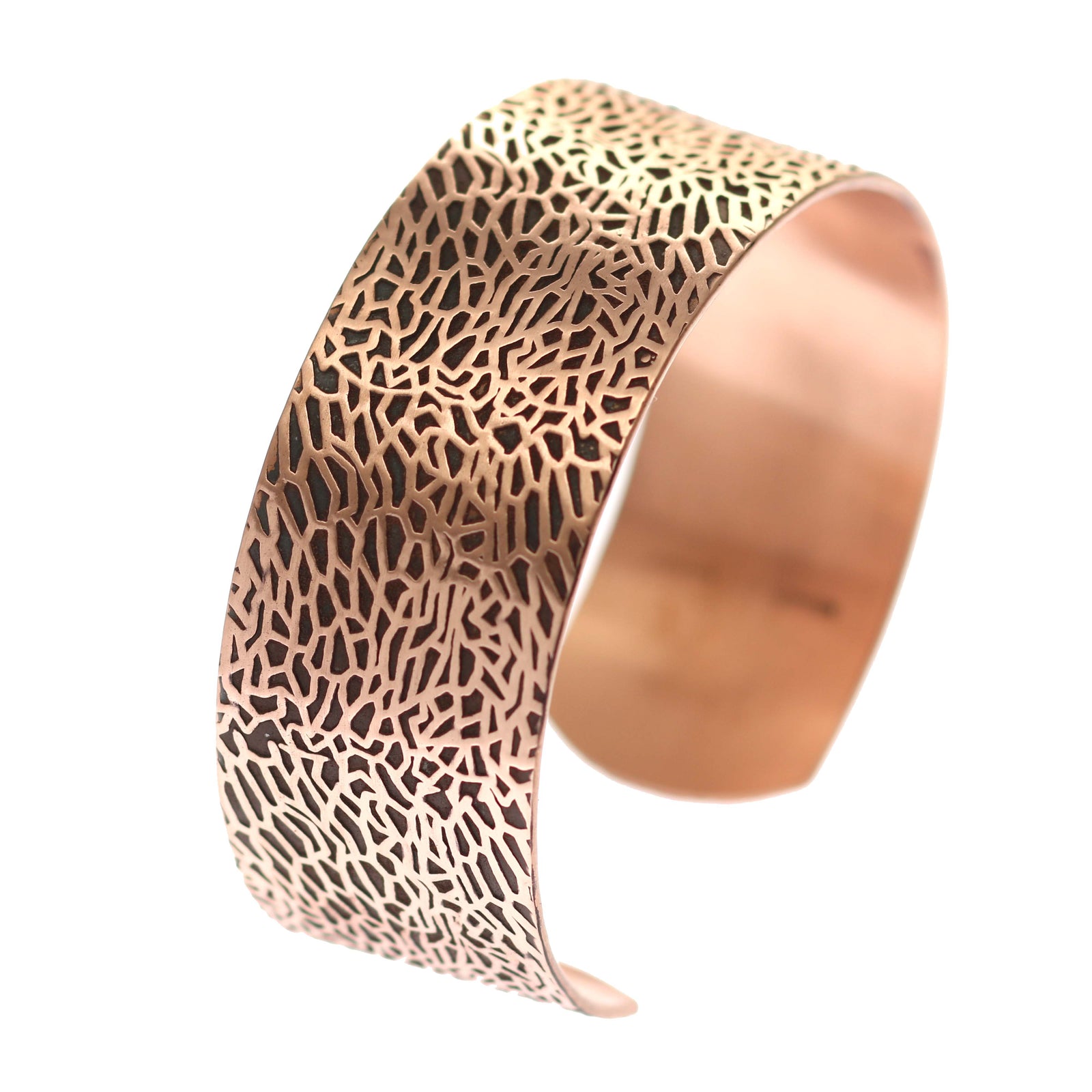 A Solid Copper Embossed Sea Fan Men's Cuff on a White Background