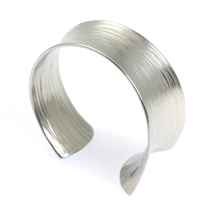 2 of 5: Right Side View of Tapered Bark Anticlastic Aluminum Bangle Bracelet