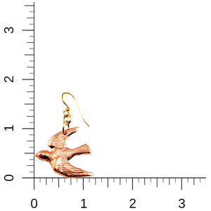 5 of 7: Copper Flying Swallow Earrings on a Ruler for Size Dimensions