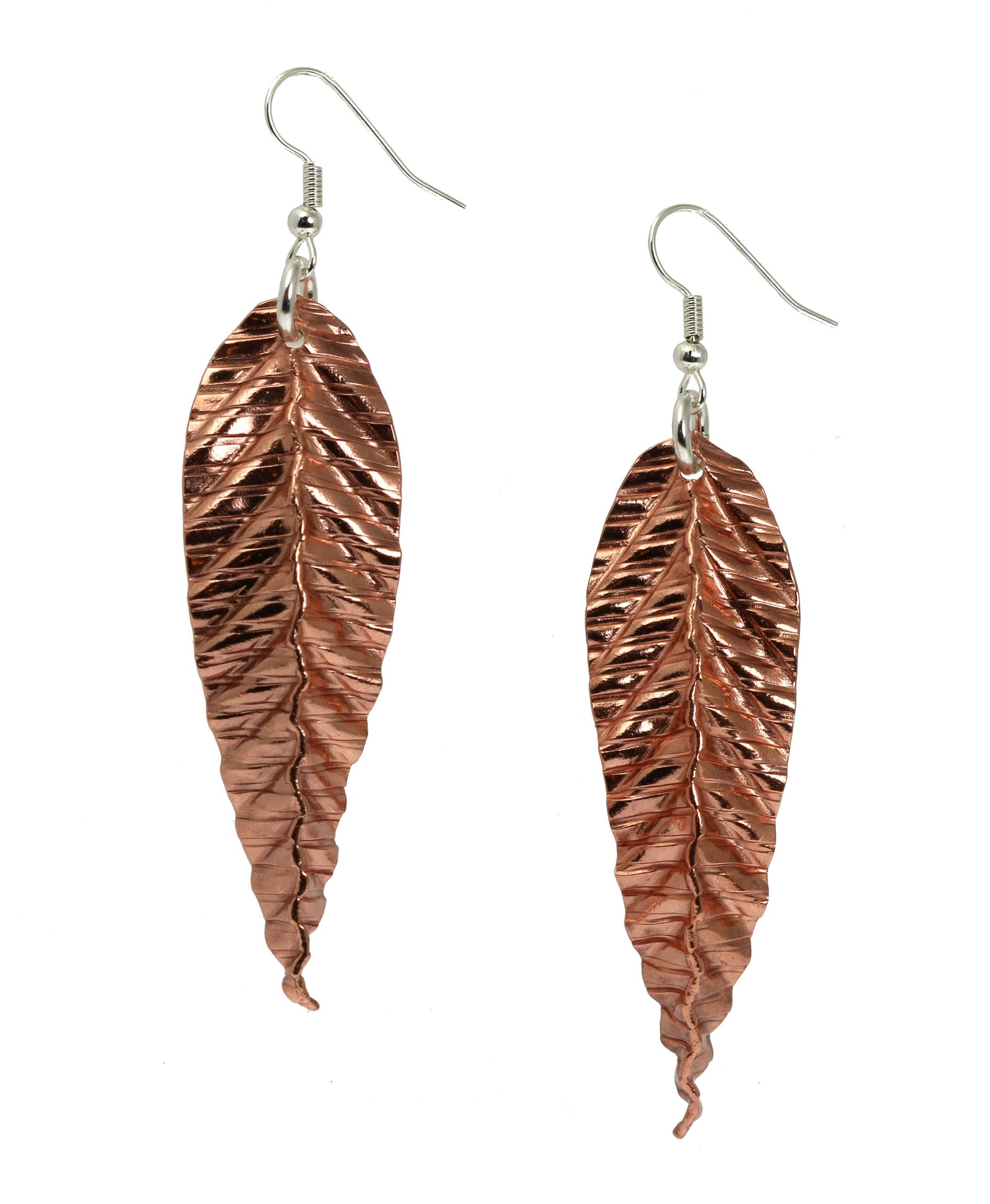 A Pair of Corrugated Fold Formed Copper Leaf Earrings on a White Background