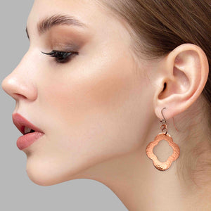 8 of 8: An Elegant Woman Wearing Medium Pierced Copper Clover Drop Earrings