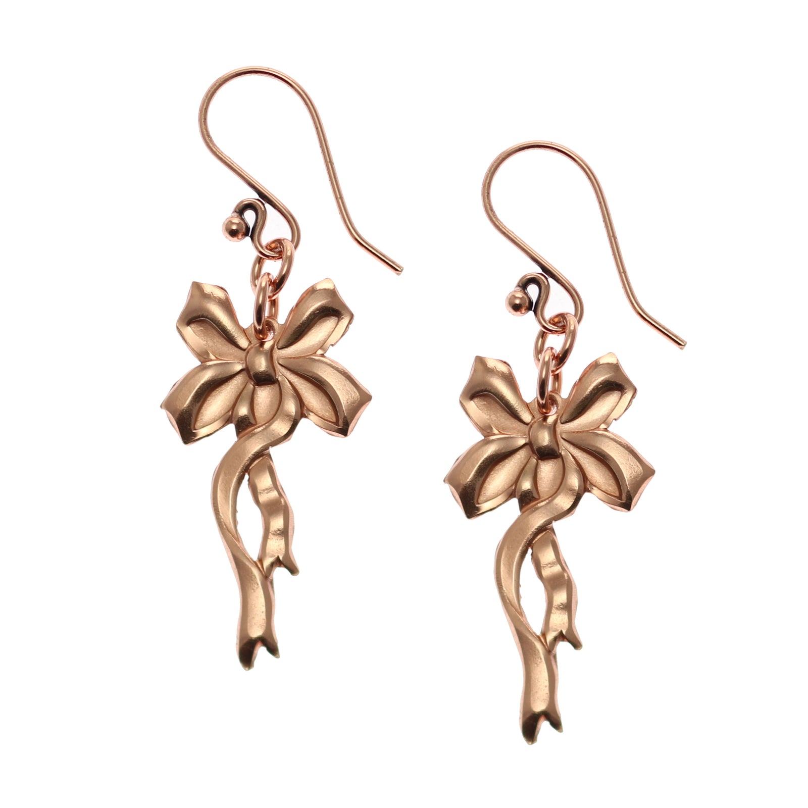 A Pair of Yuletide Ribbon Copper Dangle Earrings on a White Background