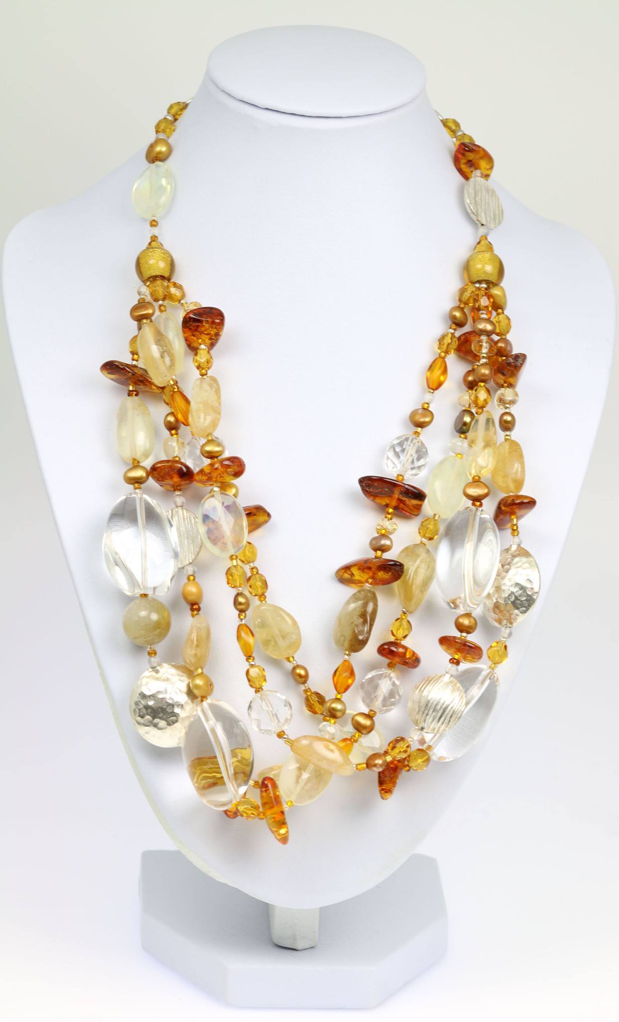 An Amber Citrine Crystal Quartz Beaded Gemstone Necklace on a White Neck Display