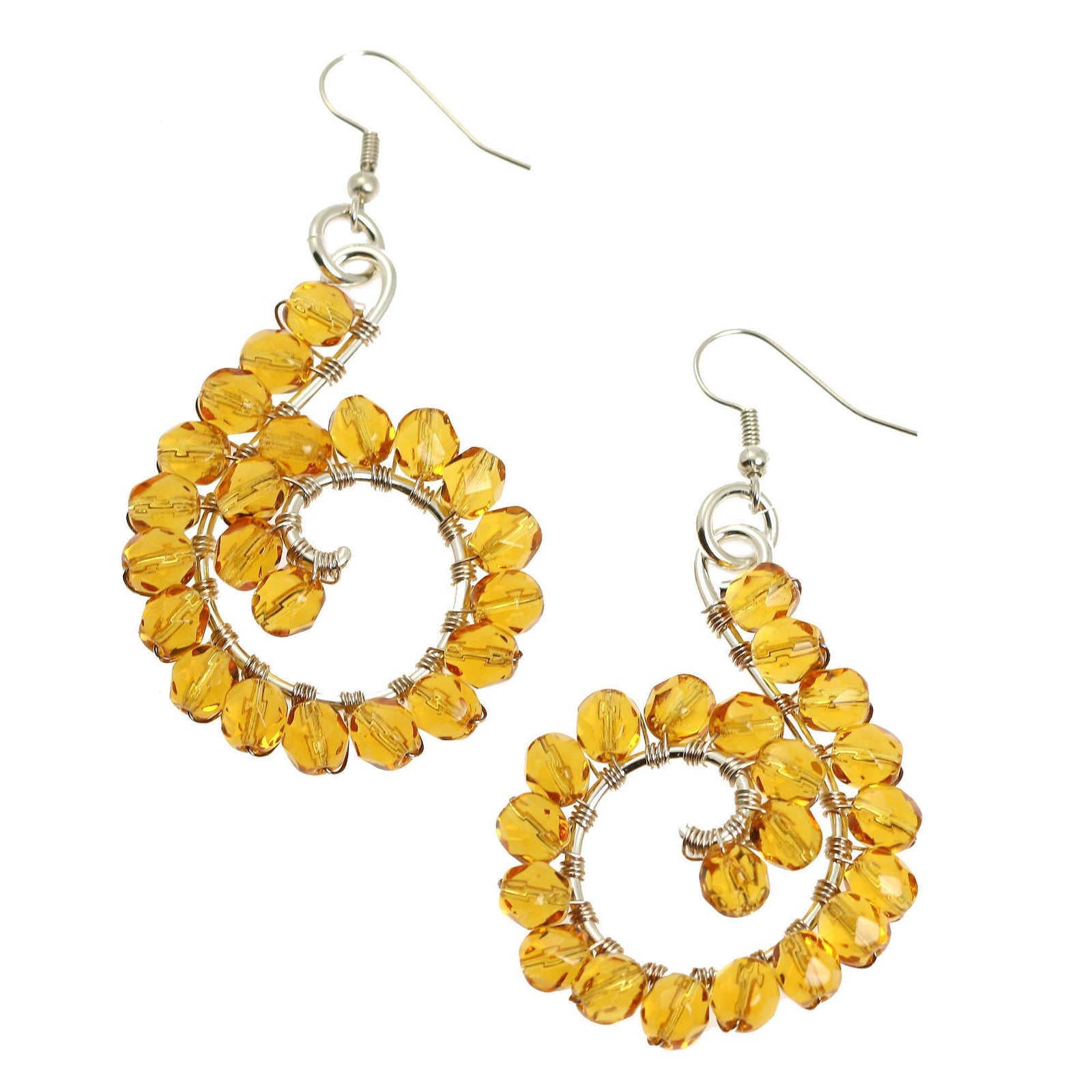 A Pair of Amber Wire Wrapped Sterling Silver Earrings on a White Background