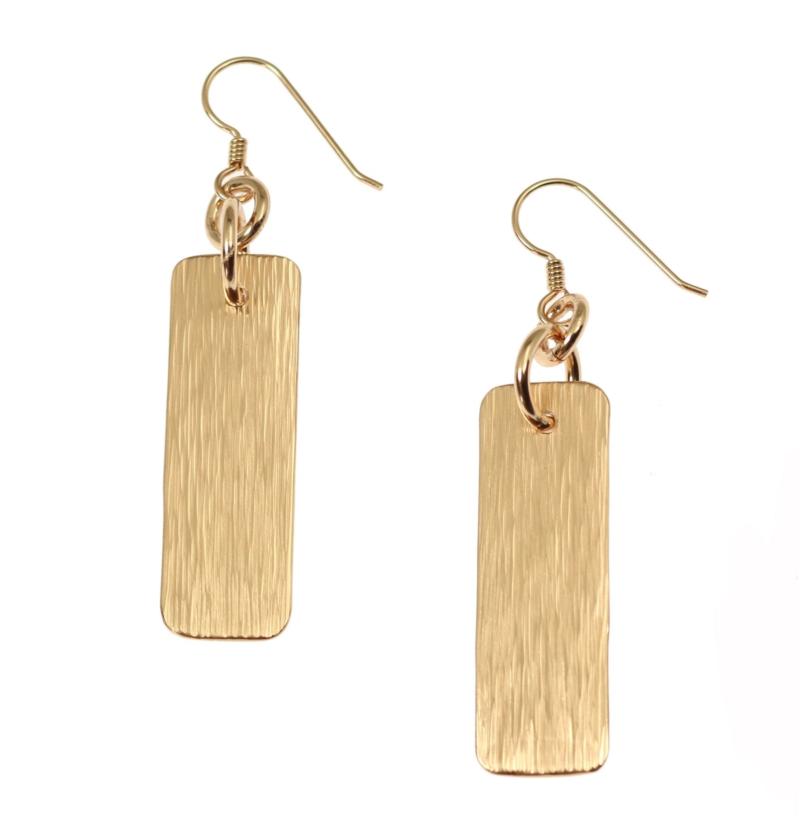 A Pair of Bronze Bark Dangle Earrings on a White Background