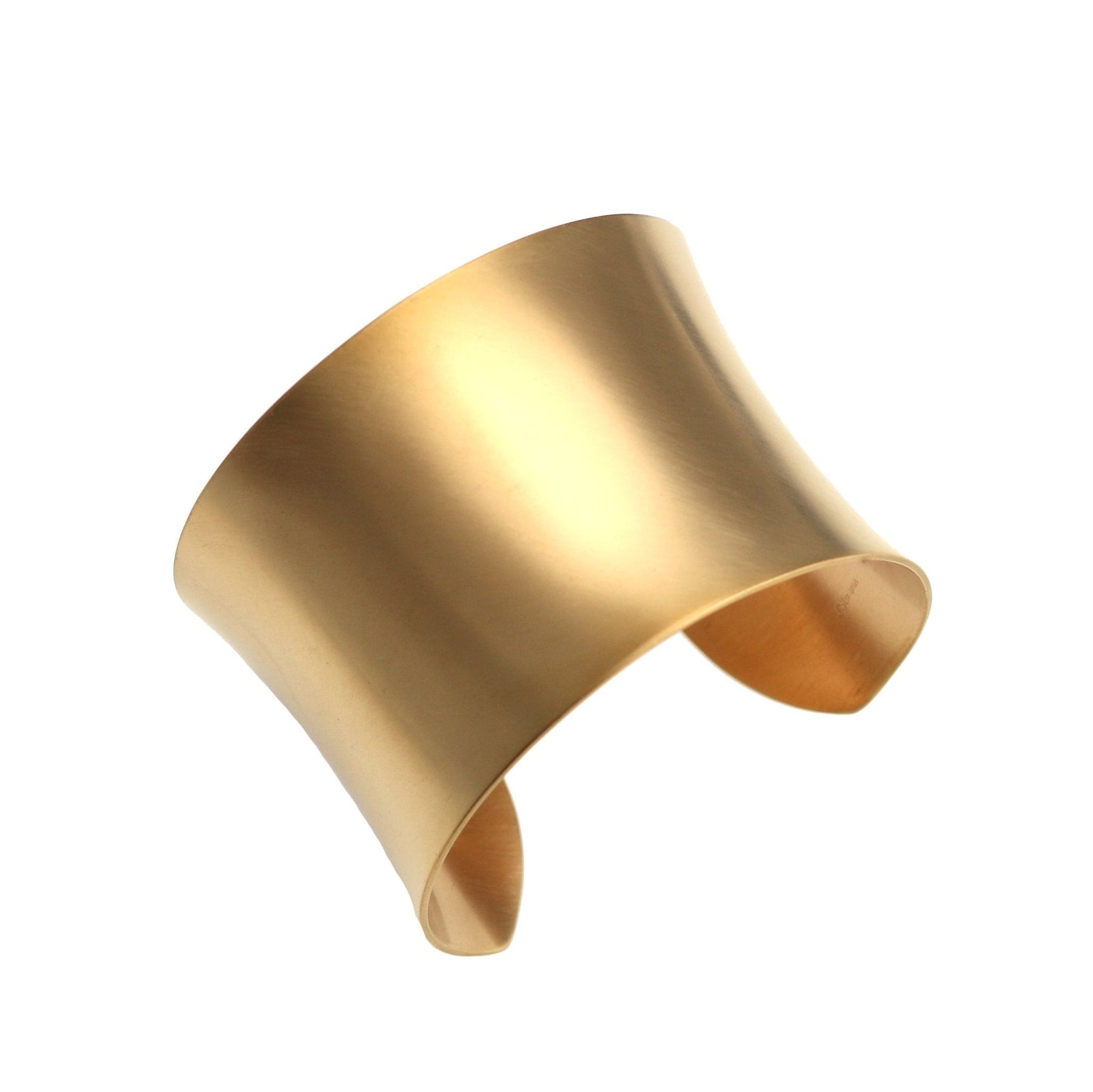 A Brushed Anticlastic Bronze Cuff Bracelet on a White Background