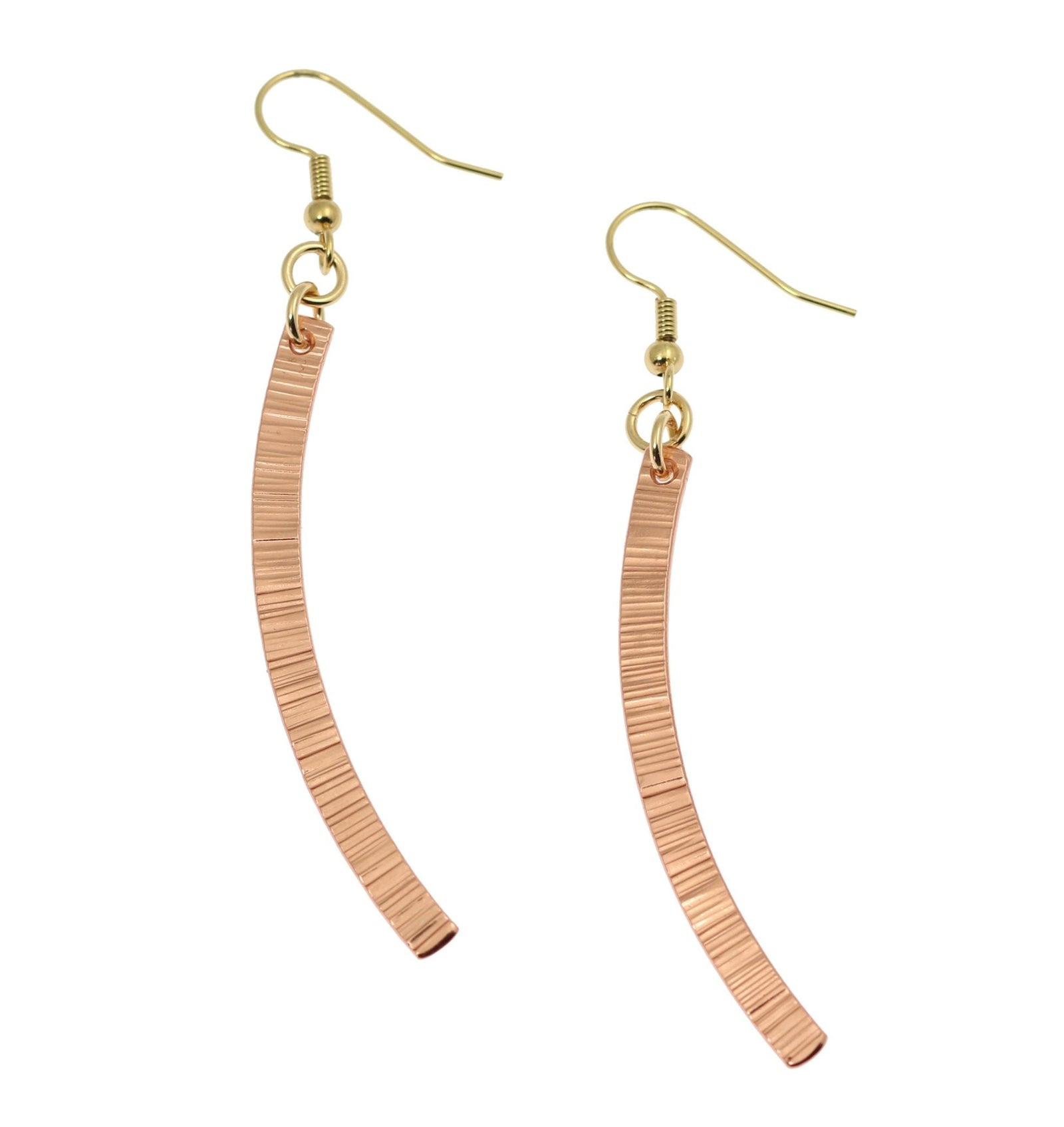 A Pair of Chased Copper Dangle Drop Earrings on a White Background