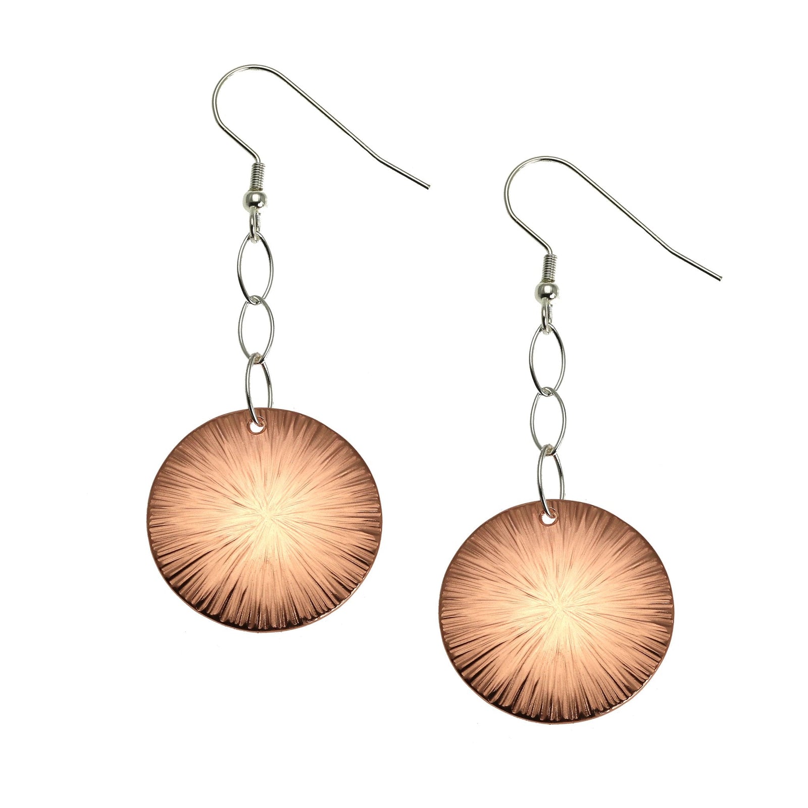 A Pair of Chased Disc Copper Dangle Earrings on a White Background