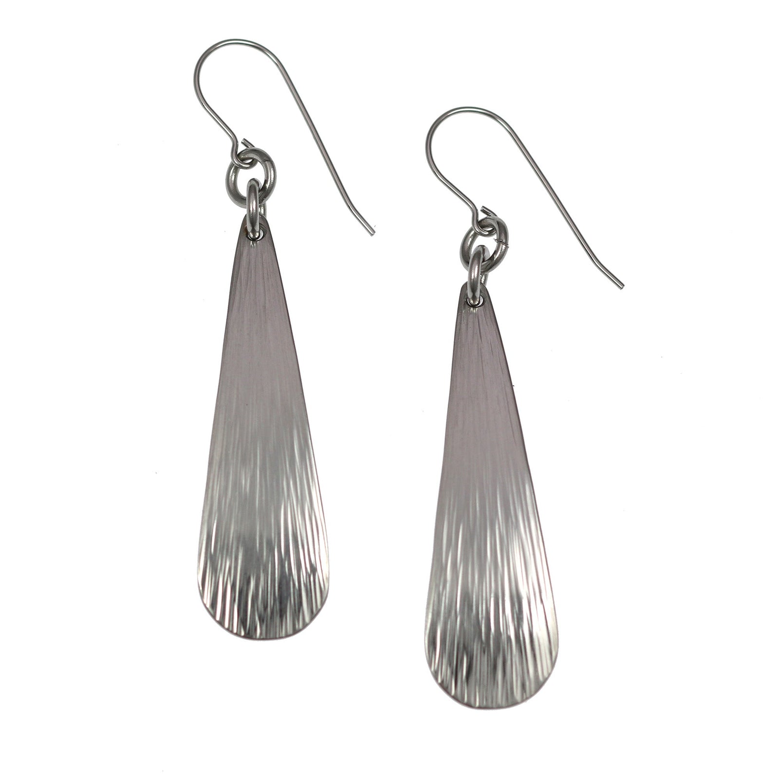A Pair of Chased Stainless Steel Long Teardrop Earrings on a White Background