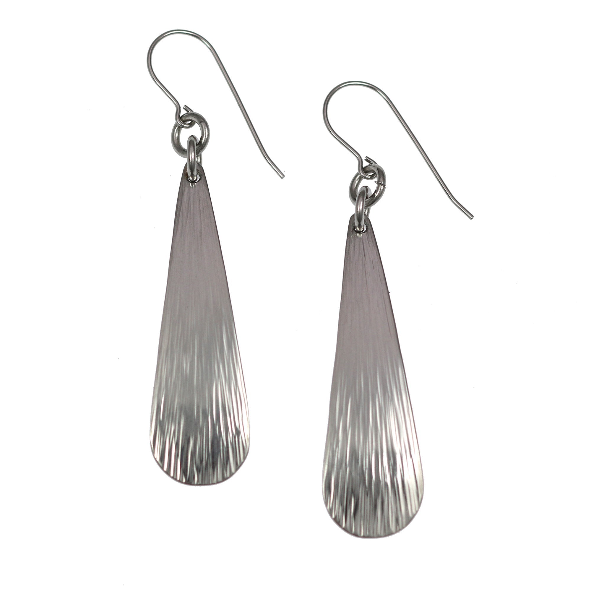 1 of 5: A Pair of Chased Stainless Steel Long Teardrop Earrings on a White Background