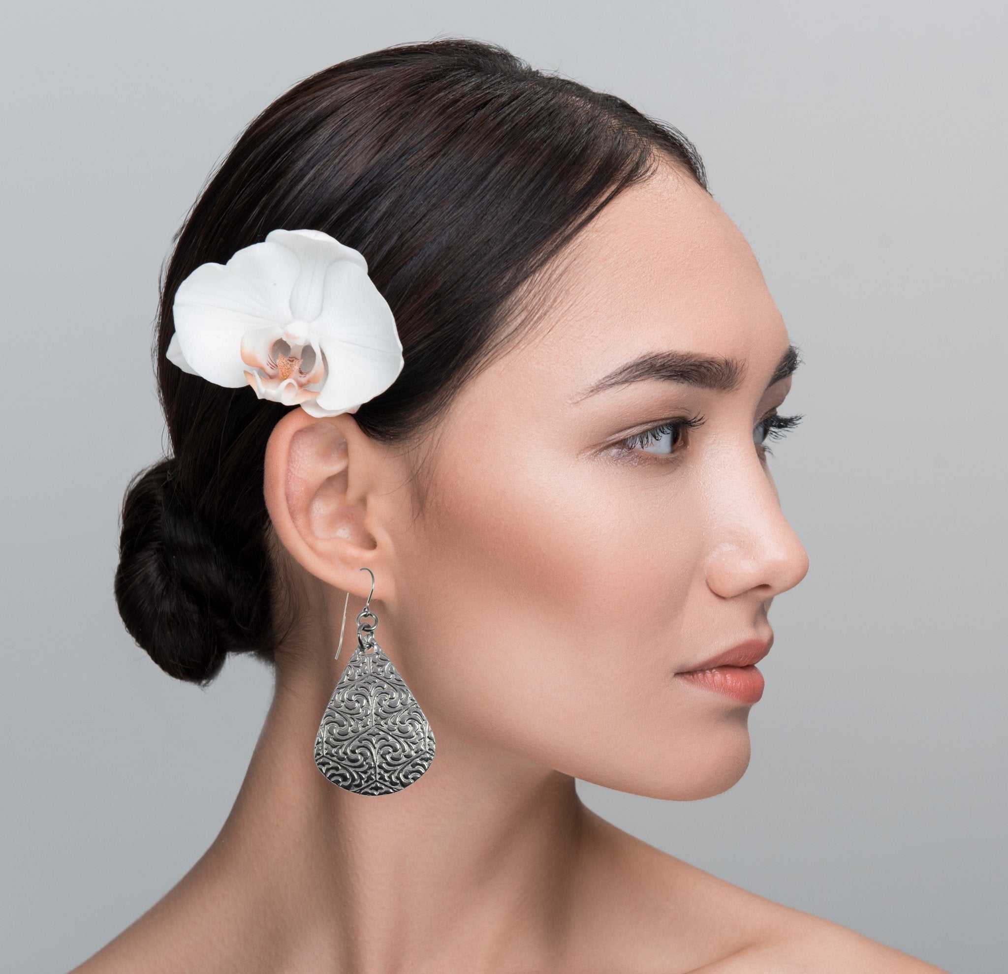 2 of 6: Female Model Wearing Damask Embossed Aluminum Drop Earrings