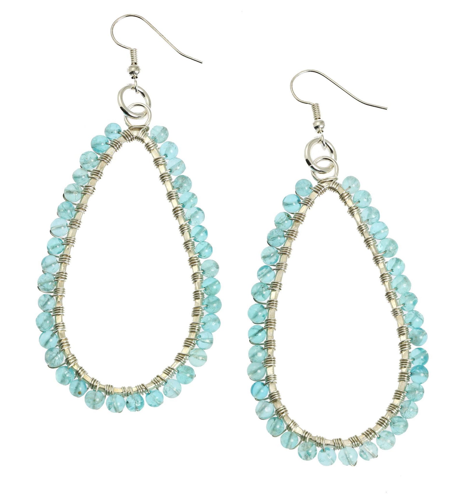 A Pair of Hammered Silver Drop Earrings with Apatite on a White Background