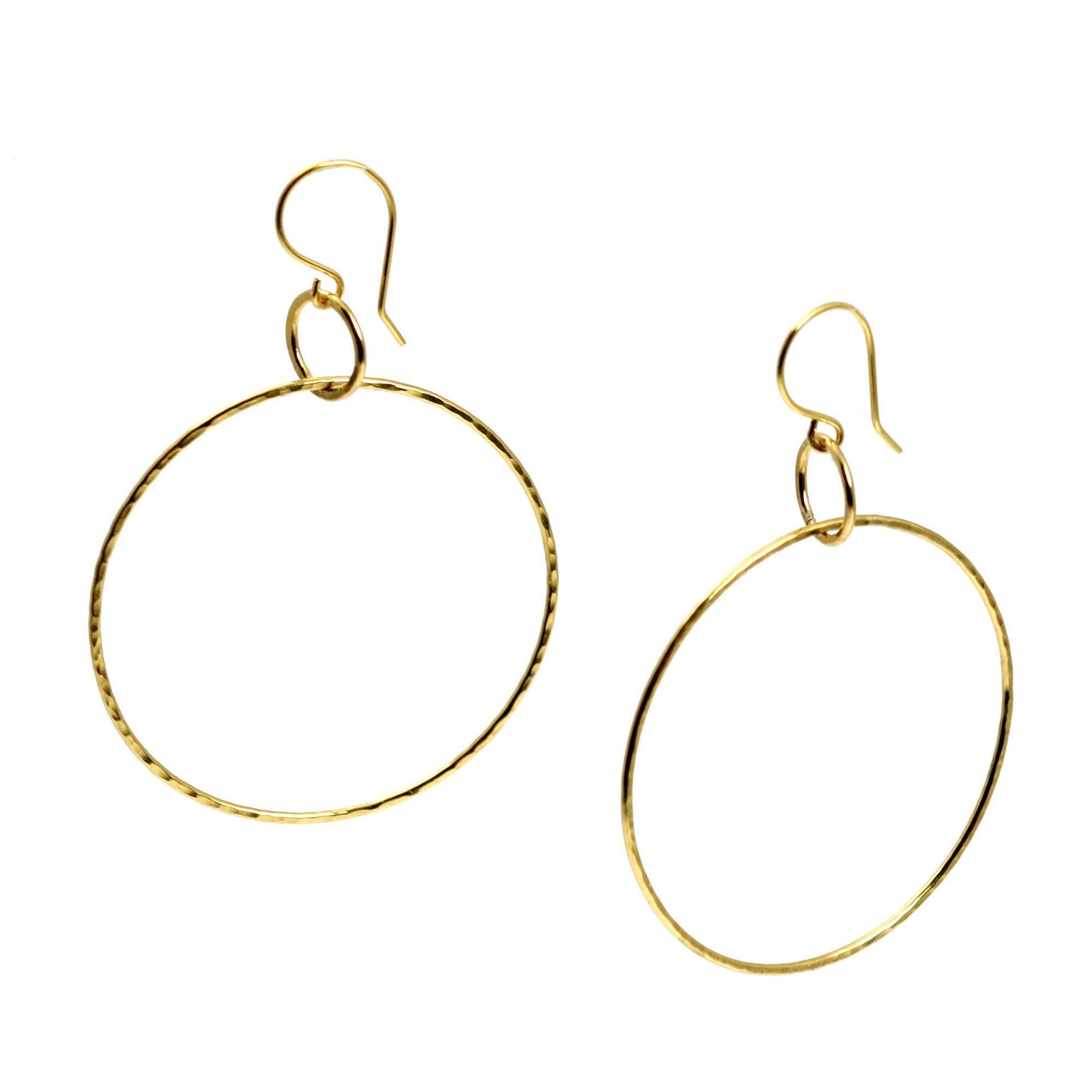 A Pair of Hammered Nu Gold Brass Hoop Earrings on a White Background
