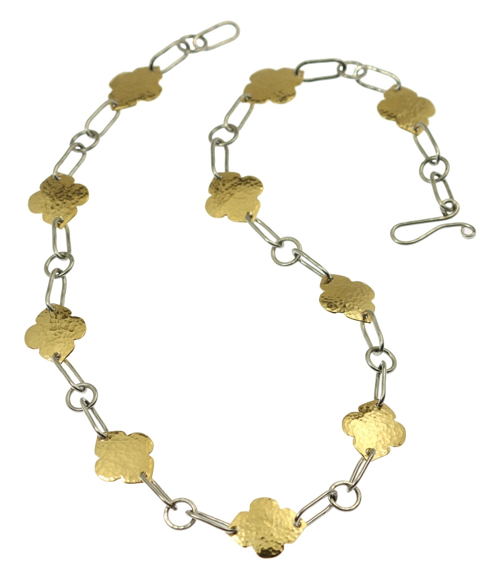 A Hammered Steel Link Necklace with Nu Gold Quatrefoil Accents on a White Background