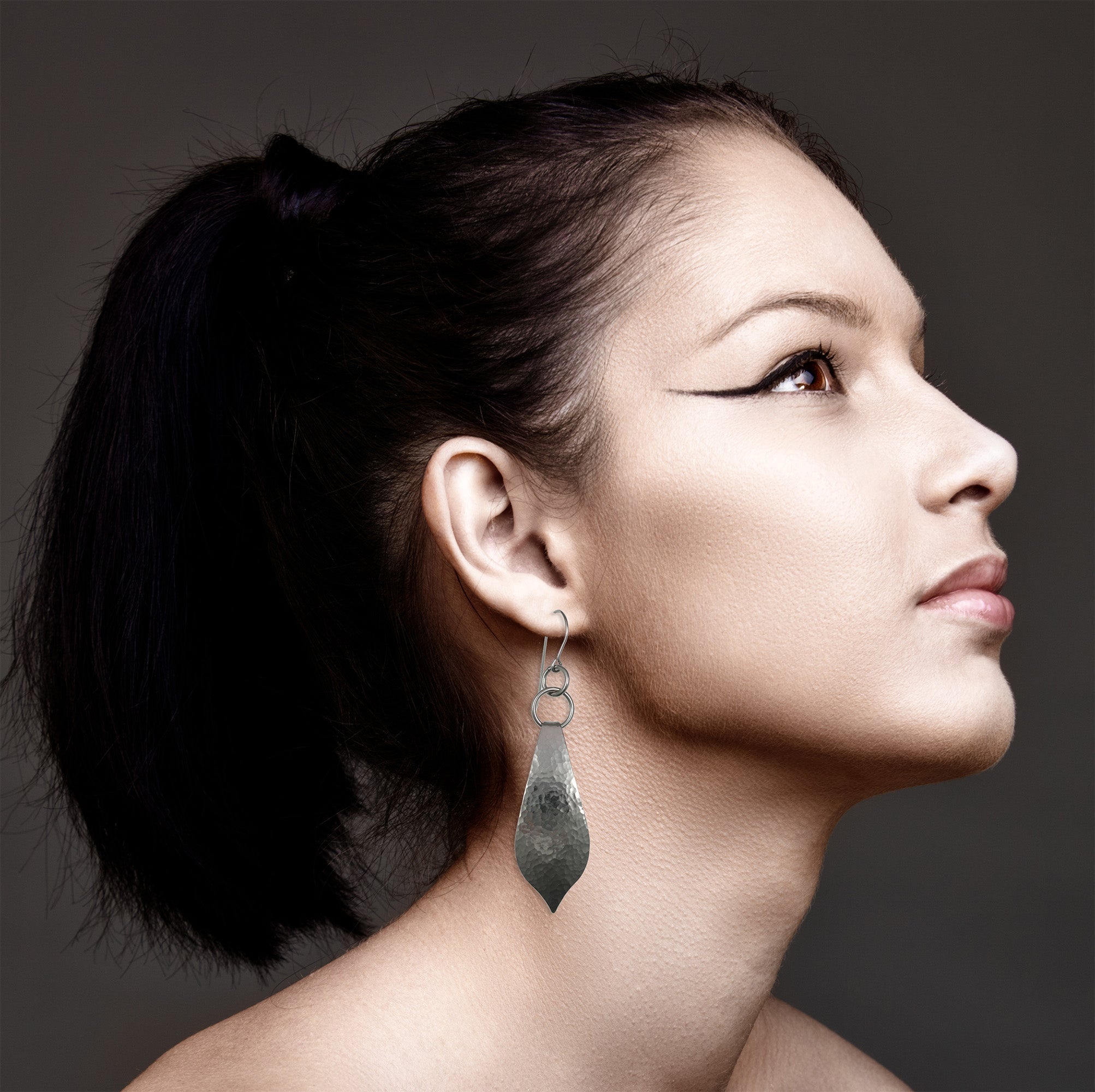 2 of 5: Woman Wearing Hammered Stainless Steel Marrakesh Earrings