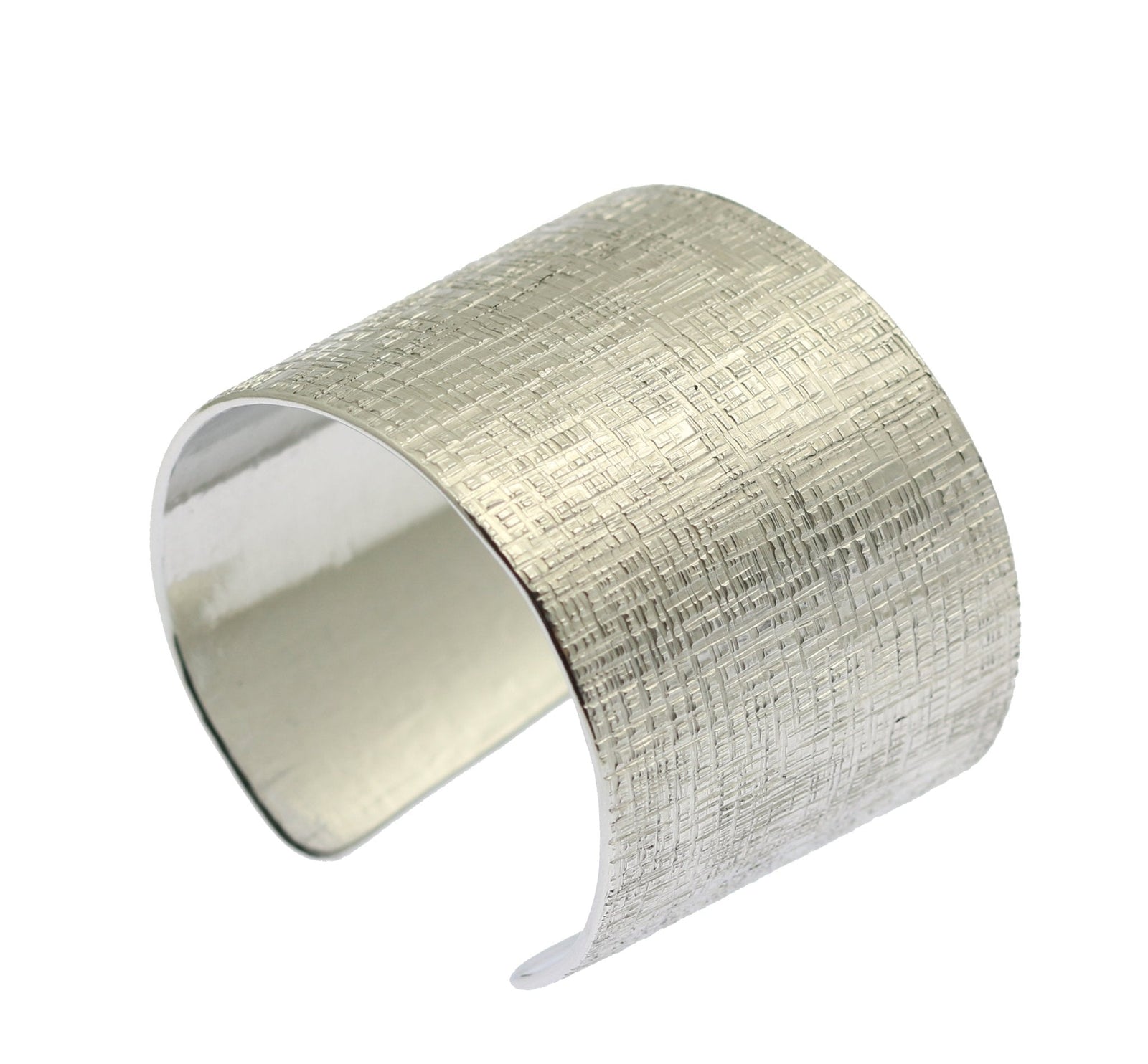 A Linen Texturized Aluminum Cuff on a White Background