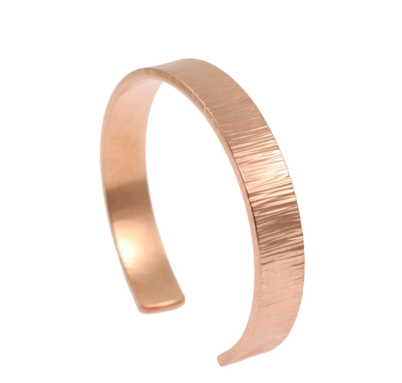 A 10mm Wide Men's Chased Copper Cuff Bracelet on a White Background