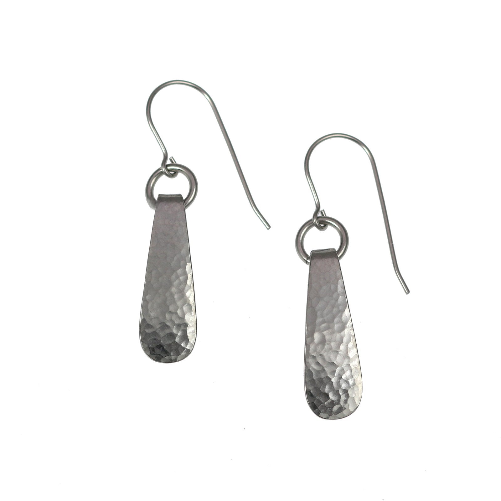 A Pair of Mini Hammered Stainless Steel Drop Earrings on a White Background