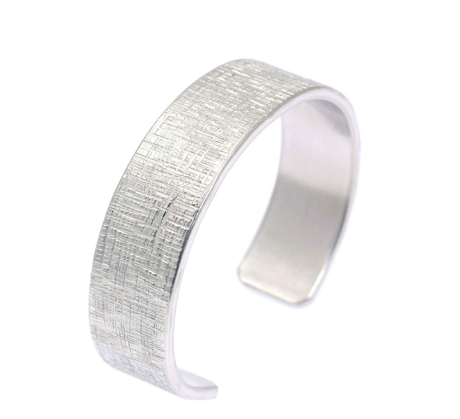 A Linen Aluminum Cuff Bracelet on a White Background