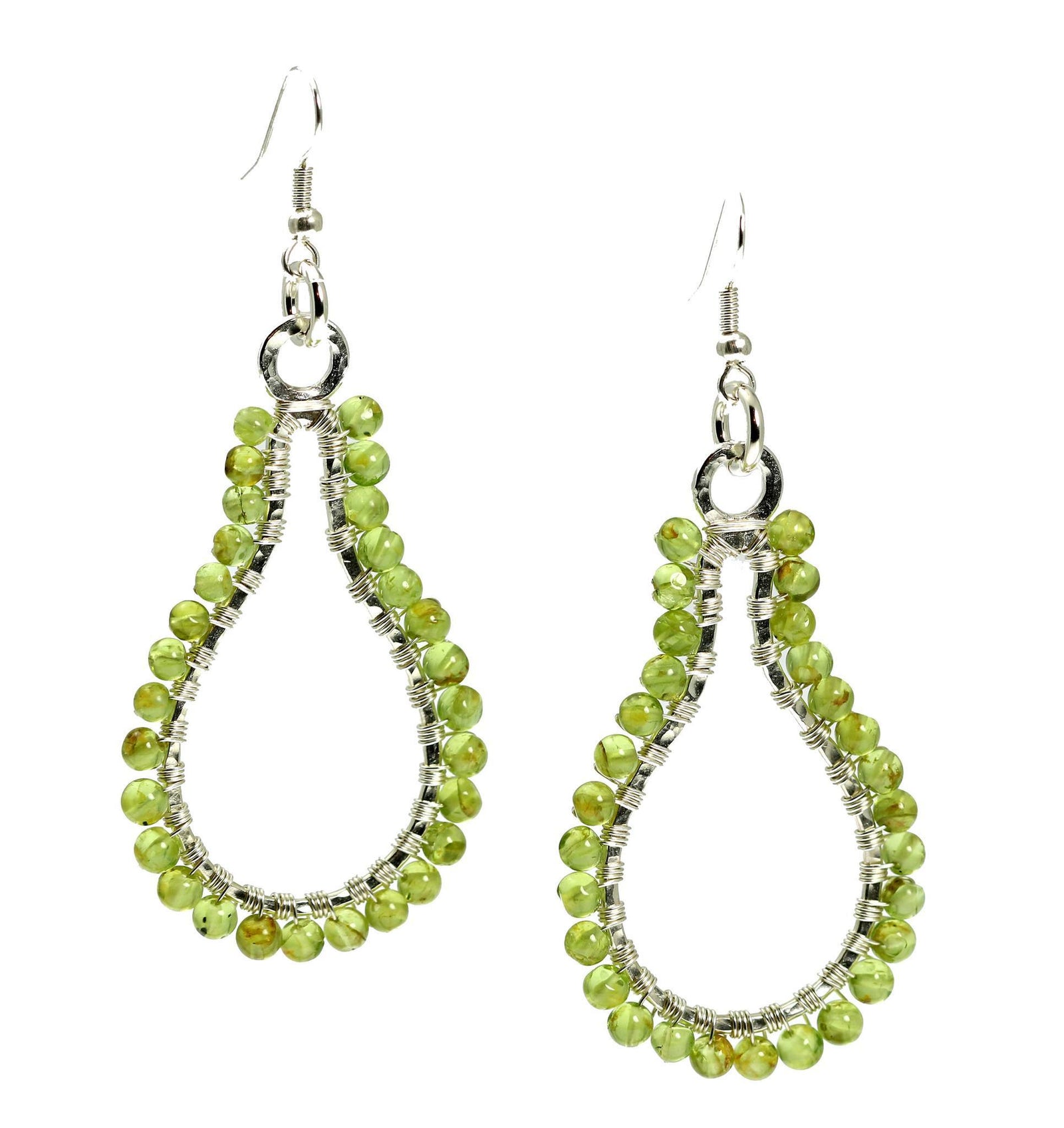 A Pair of Hammered Silver Drop Earrings with Peridot on a White Background
