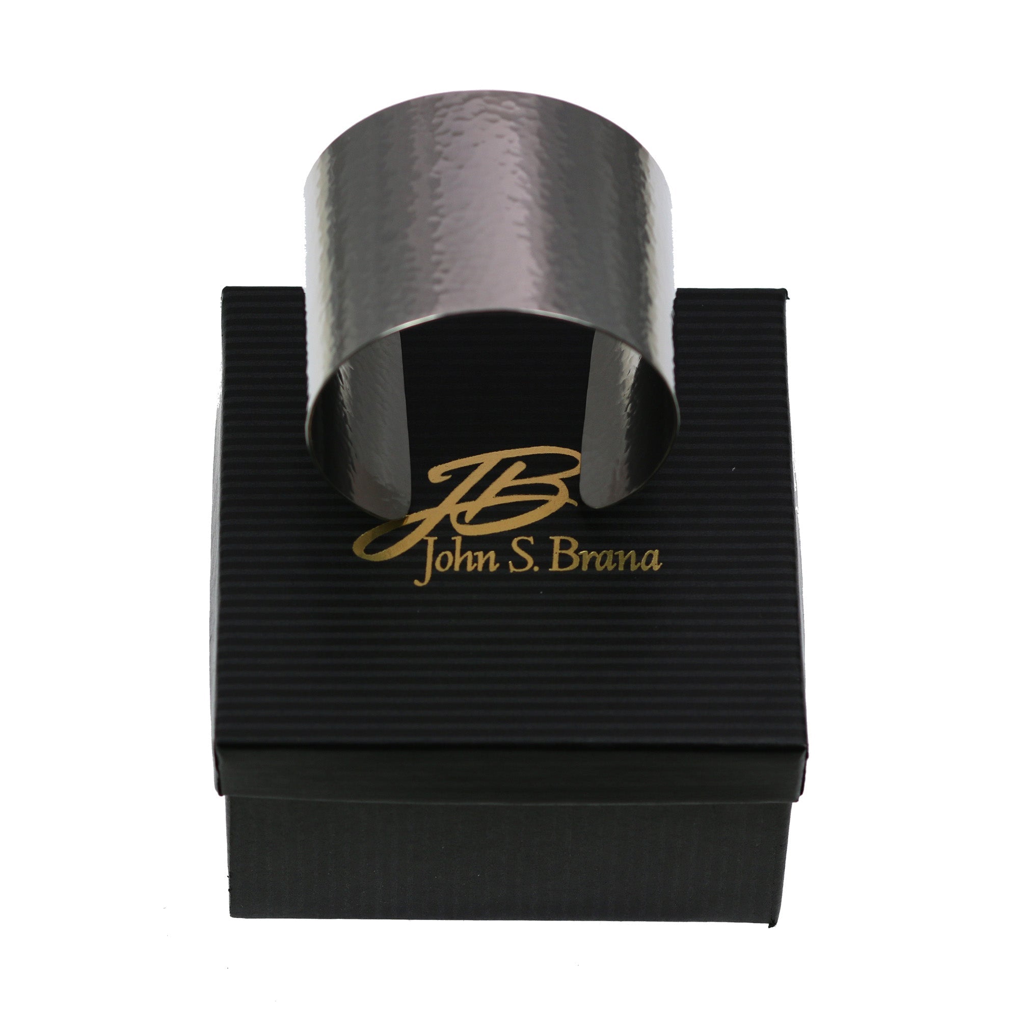 Hammered Stainless Steel Cuff Bracelet on Top of a Black Gift Box