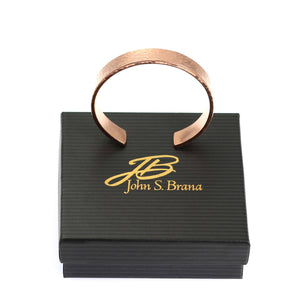 9 of 10: 10mm Wide Hammered Copper Cuff Bracelet on top of a  Black Gift Box