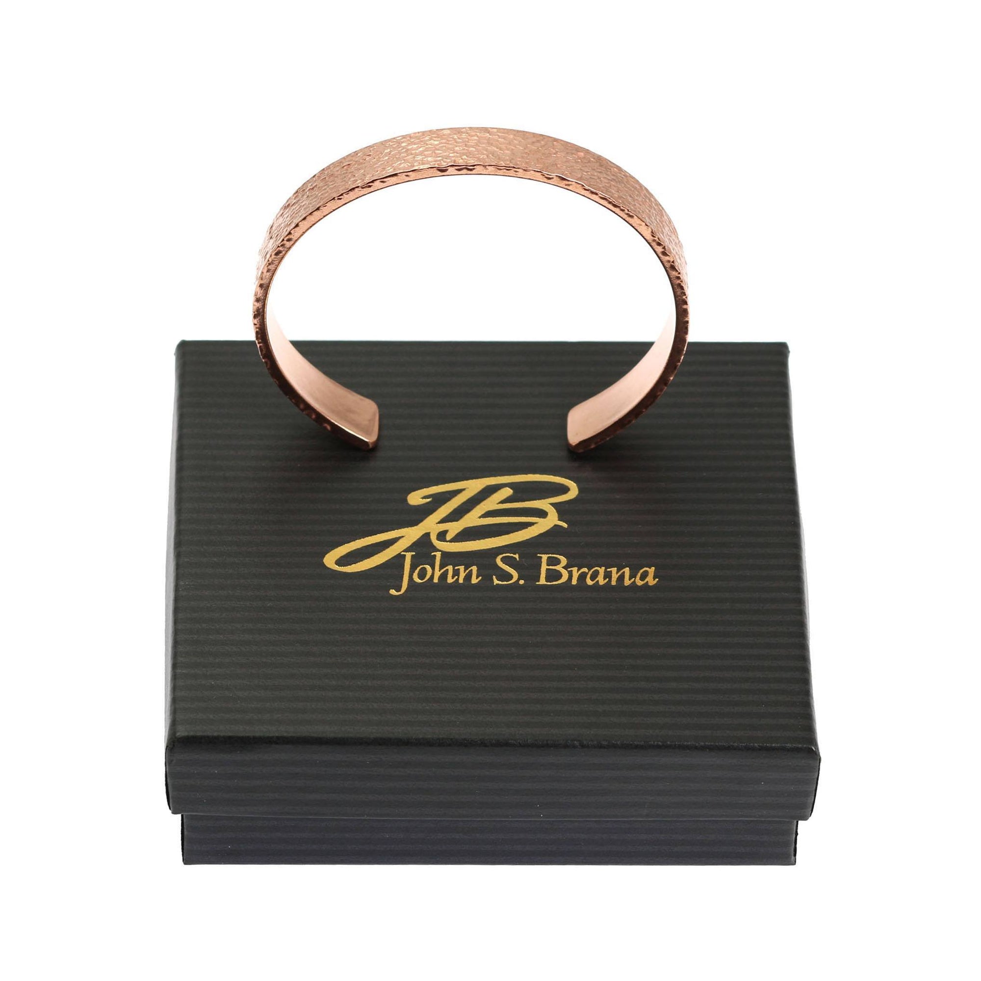 10mm Wide Texturized Copper Cuff Bracelet on top of a Black Gift Box