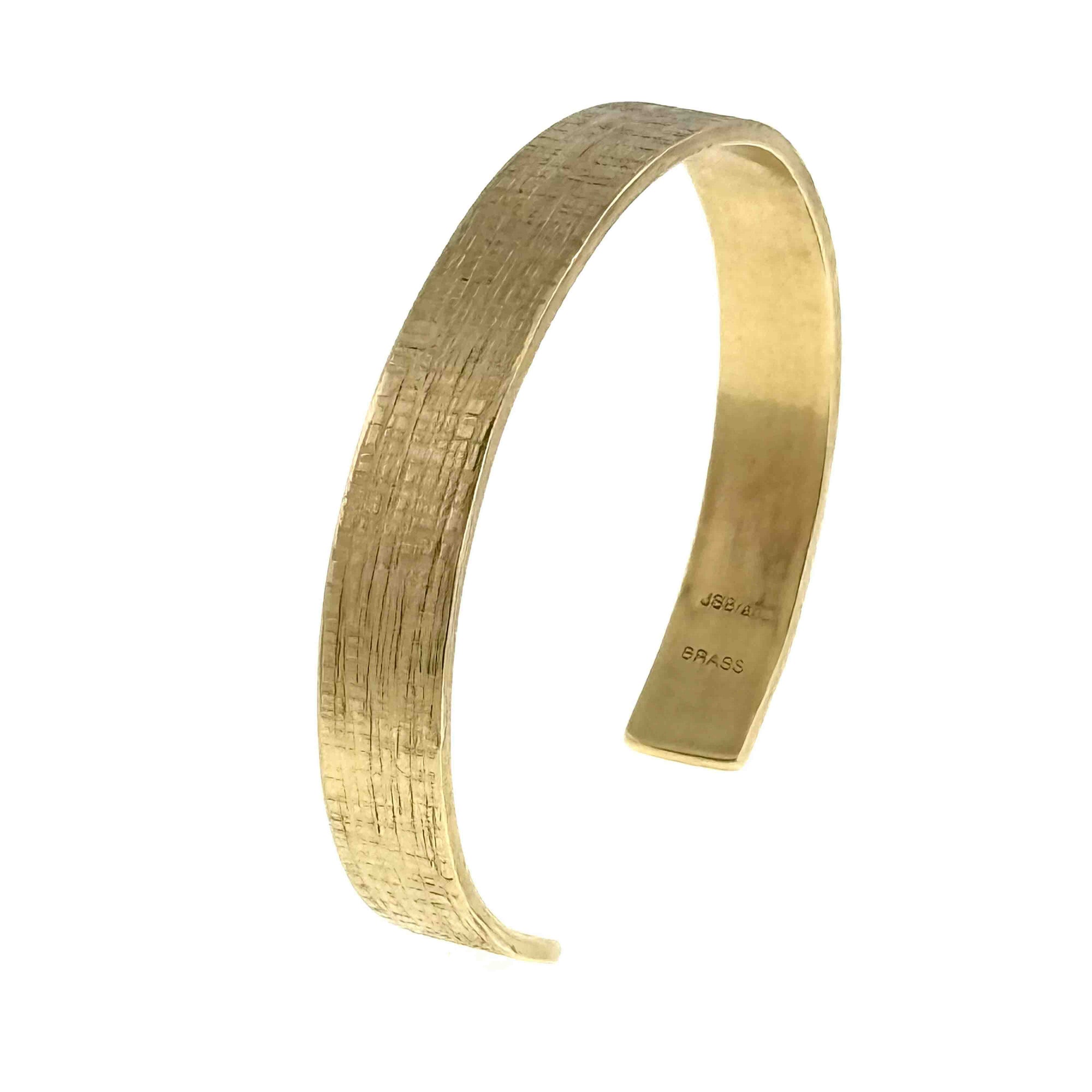 10mm Wide Linen Nu Gold Tone Brass Cuff Bracelet on a white background - Left Side View