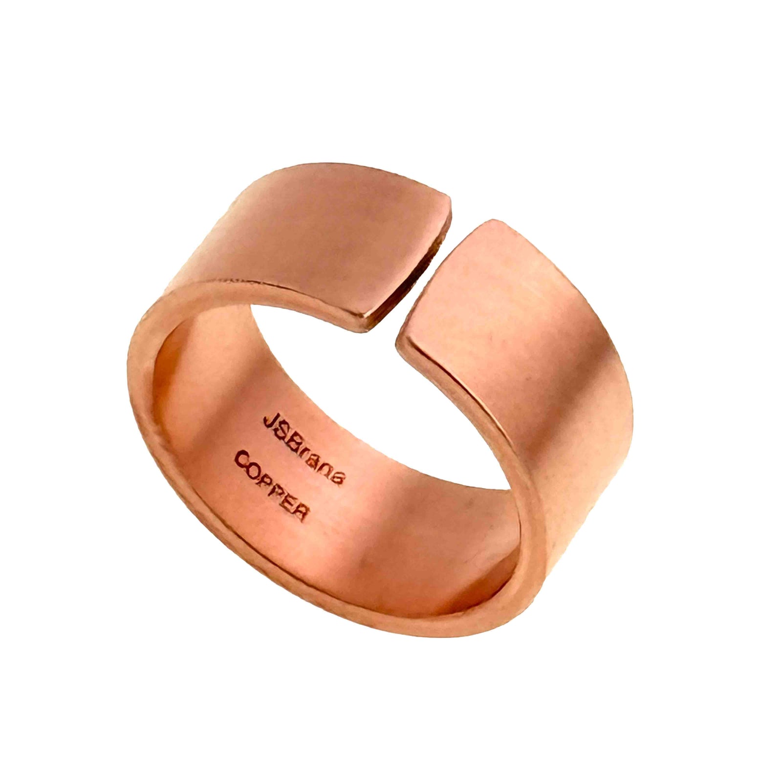 Matte copper cuff ring with a wide 10mm band and open adjustable design, featuring a smooth hand polished finish and warm reddish tone, shown on a clean white background with “JSBrana Copper” stamped inside.
