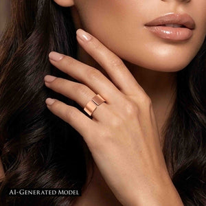 6 of 9: Close-up of a woman’s hand wearing a matte copper cuff ring with a wide open band and smooth brushed finish, styled on the finger near her face, with soft makeup, glossy lips, and dark wavy hair in the background.  AI Generated Model.