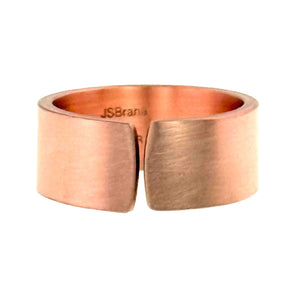 7 of 9: Front view of a matte copper cuff ring with a wide 10mm band and open adjustable gap, featuring a smooth brushed finish and warm reddish tone, with “JSBrana” stamped inside, displayed on a clean white background.