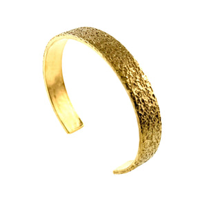 1 of 9: Textured Nu Gold brass cuff bracelet with a wide, hammered surface and open-back design, showcasing a warm golden tone and minimalist, handcrafted style.