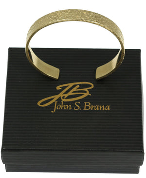 7 of 7: 10mm Wide Texturized Nu Gold Tone Brass Cuff Bracelet on Top of a Black Gift Box