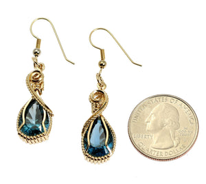 2 of 4: 12 CT London Blue Topaz 14K Gold-filled Earrings Size compared to a US Quarter for Size Dimensions