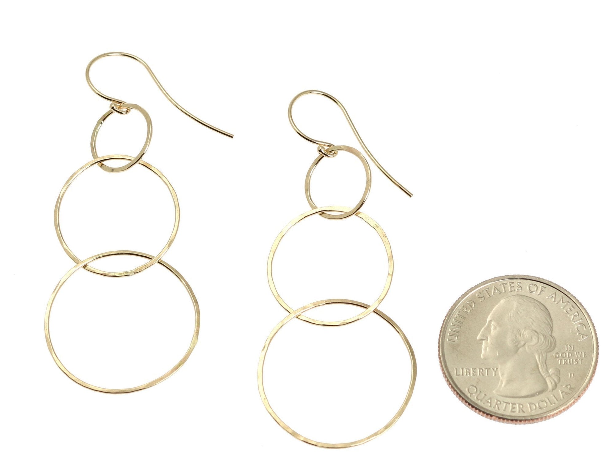 Size of 14K Gold Hammered Chandelier Earrings compared to a US Quarter