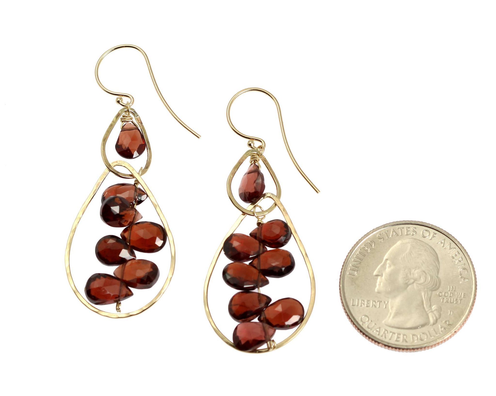 Size of 14K Gold Hammered Earrings With Garnets compared to a US Quarter Coin