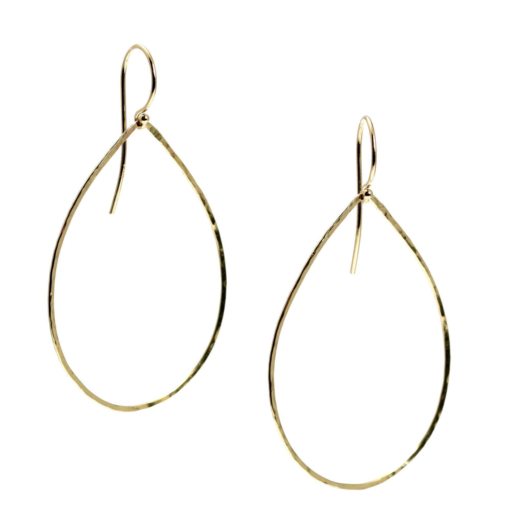Close Up of 14K Gold Hammered Tear Drop Earrings