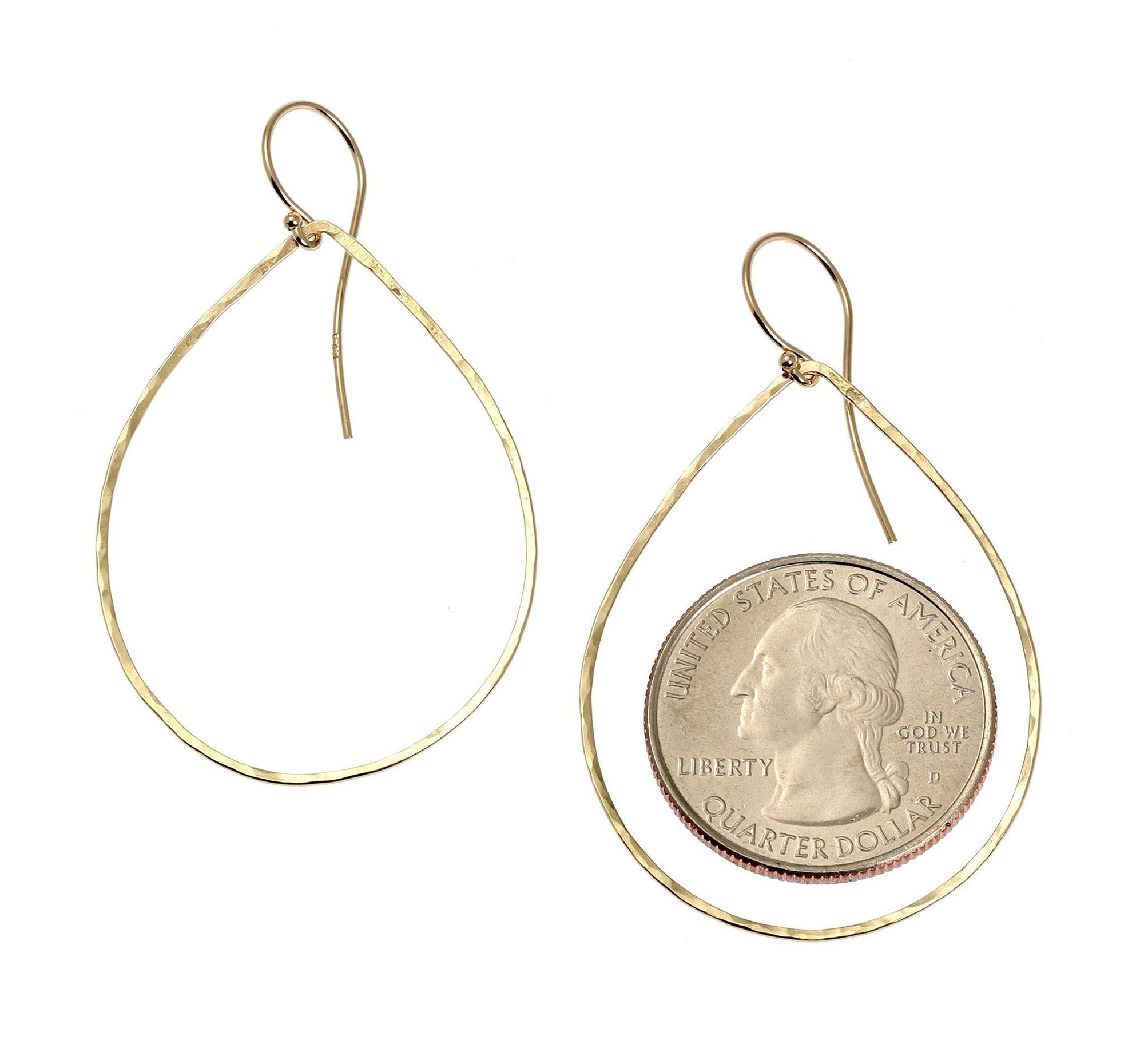 Size of 14K Gold Hammered Teardrop Earrings compared to a US Quarter Coin