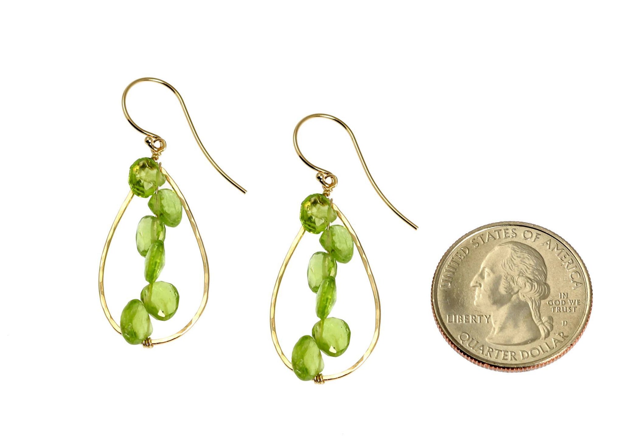 Size of 14K Gold Hammered Teardrop Earrings With Peridot compared to a US Quarter Coin
