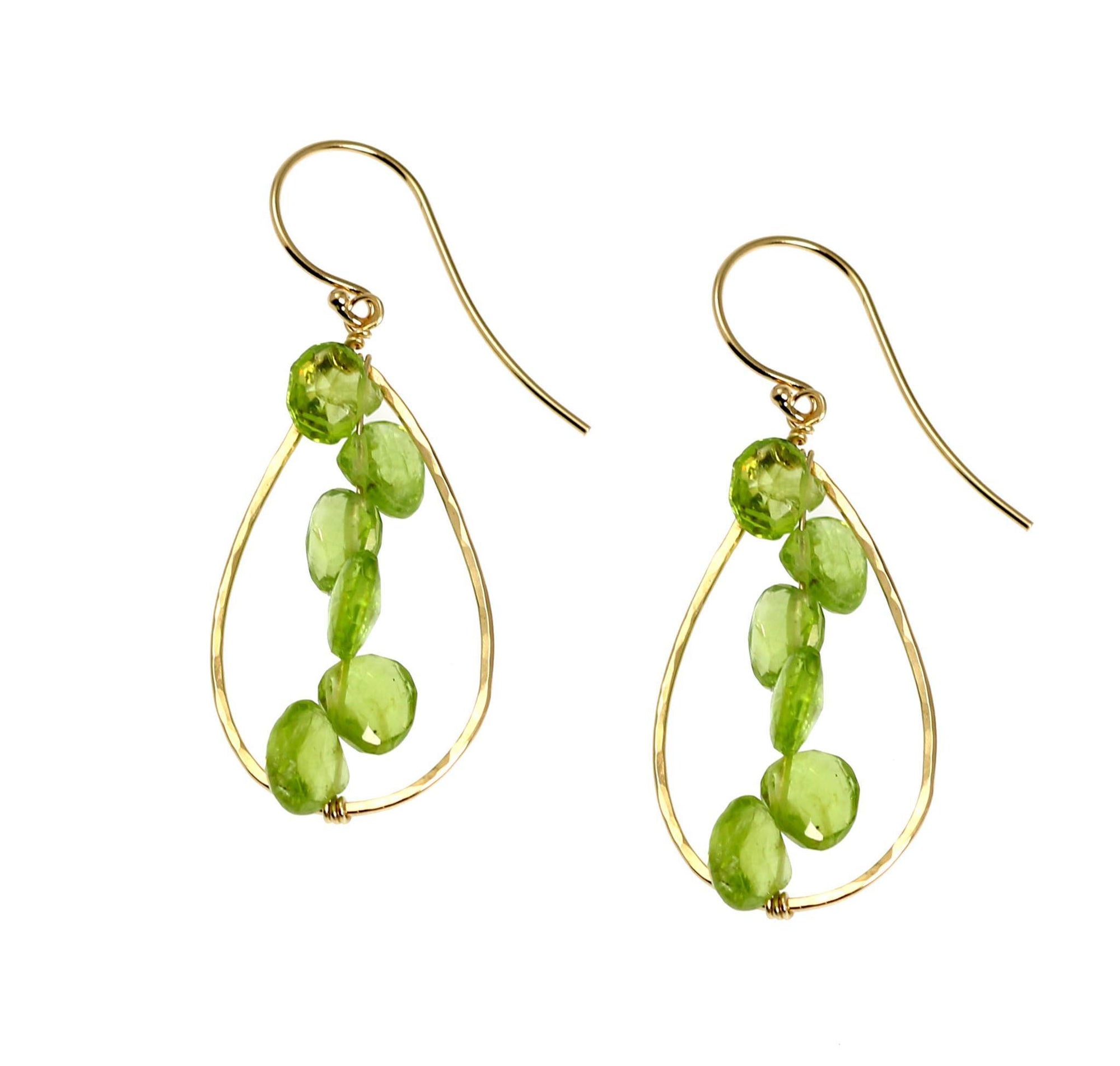 A Pair of 14K Gold Hammered Teardrop Earrings with Peridot on a White Background