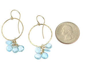 2 of 4: Size of 14K Hammered Gold Earrings With Blue Topaz compared to a US Quarter Coin