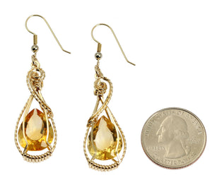2 of 4: Size of 19 CT Cushion Cut Citrine 14K Gold-filled Earrings compared to a US Quarter Coin