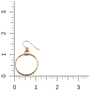 5 of 8: Single 1 inch hammered bronze hoop earring positioned beside an inch ruler on a white background. The image shows the hoop measuring about 1 inch across and the full earring measuring approximately 1 3/4 inches long from the top of the French ear wire to the bottom of the hoop.