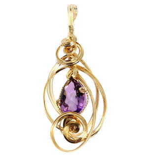 1 of 4: A 22.5 CT Amethyst 14K Gold-filled Wire Wrapped Pendant on a White Background